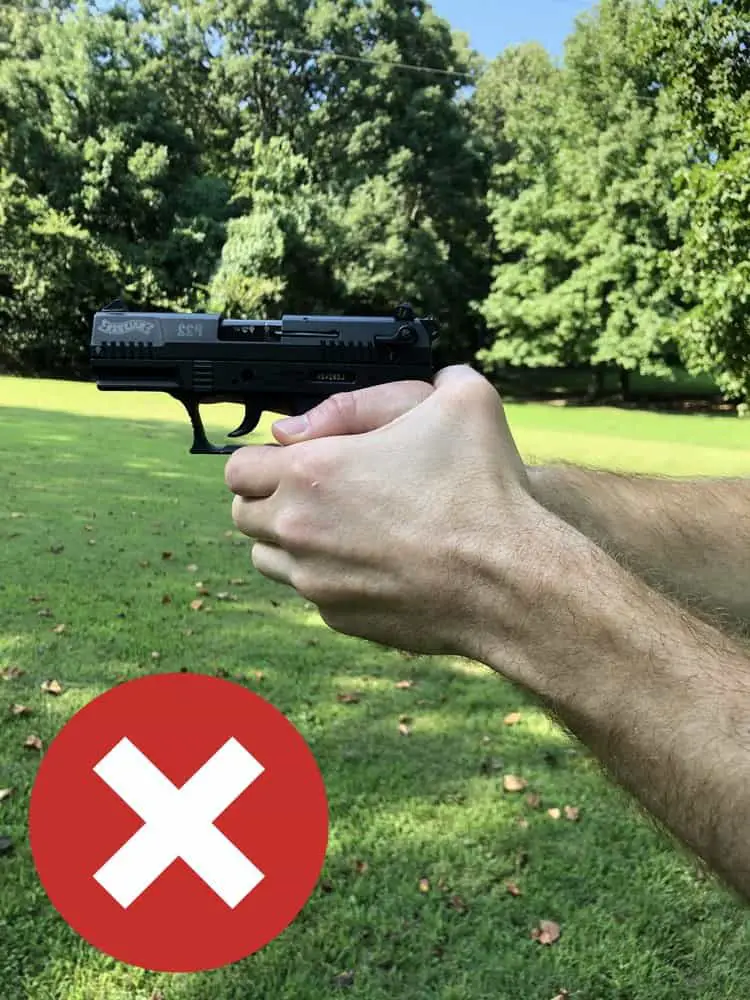 Don't cross your support hand thumb behind your handgun.